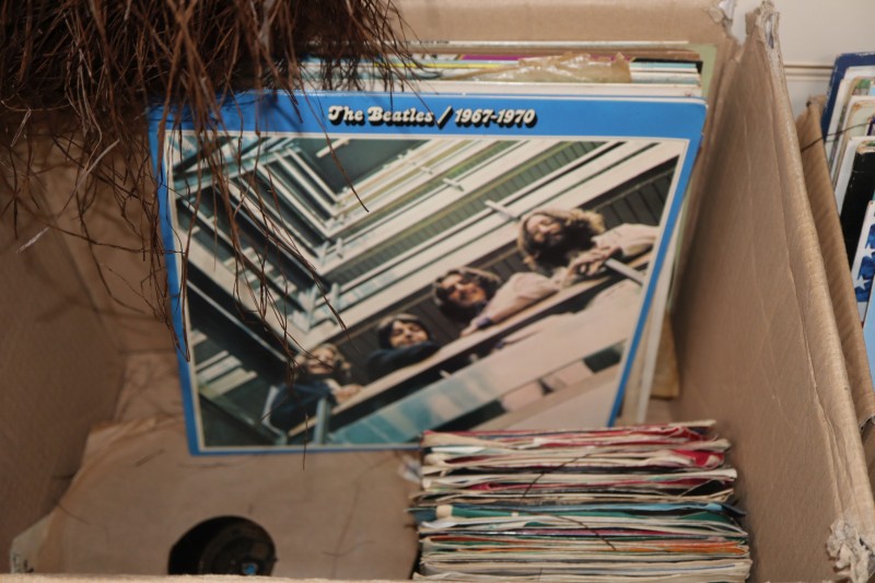 A Collection of 60s/& 70s singles including Beatles EPs and a small quantity of LPs